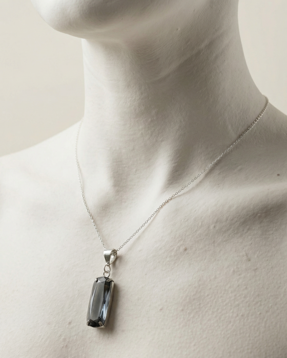 Necklace with a pendant on a mannequin